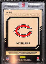 Load image into Gallery viewer, Justin Fields 2021 Gold Standard Rookie Jersey Autographs Premium #203 #/22

