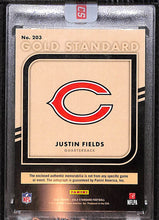 Load image into Gallery viewer, Justin Fields 2021 Gold Standard Rookie Jersey Autographs Premium #203 #/22
