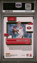 Load image into Gallery viewer, Brock Purdy 2022 Panini Donruss Optic Purple Shock #277 PSA 9
